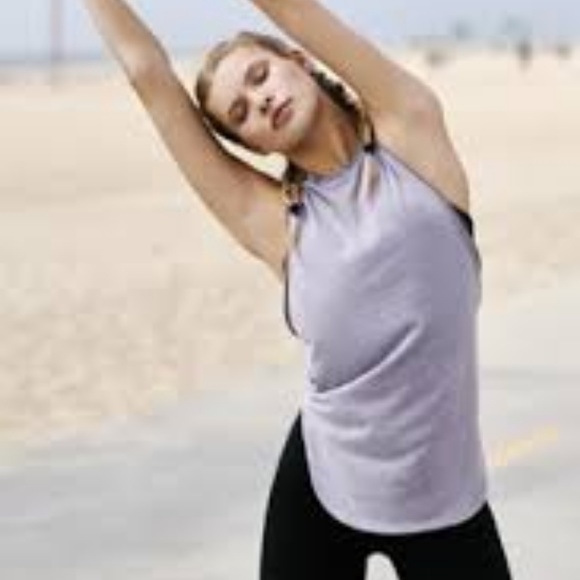 Free People  large feel muscle tee fits like large. - Picture 3 of 8